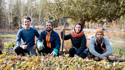 Farmers sitting in a field