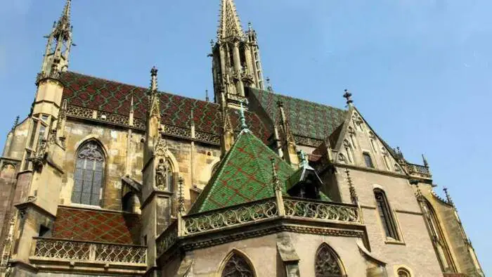 Montez au clocher d'une collégiale gothique Collégiale Saint-Thiebaut Thann