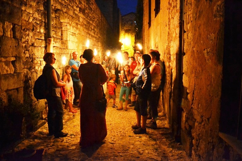 Visite commentée de la bastide de Monpazier aux flambeaux Place des cornières Monpazier 2026-08-10